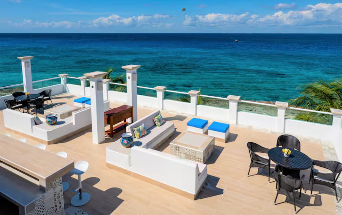 Daytime rooftop patio with Caribbean views at Ocean Sanctuary